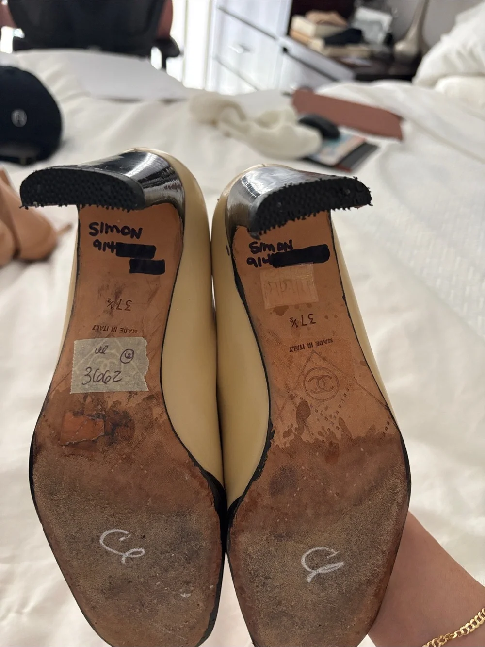 CHANEL Beige and Black Cap-Toe Bow Mid-Heel Pumps